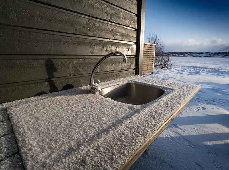 frozen sink outside