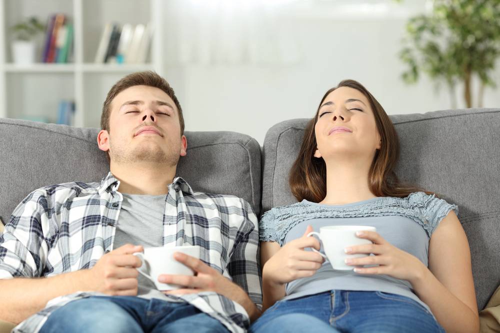 relaxed couple resting at home